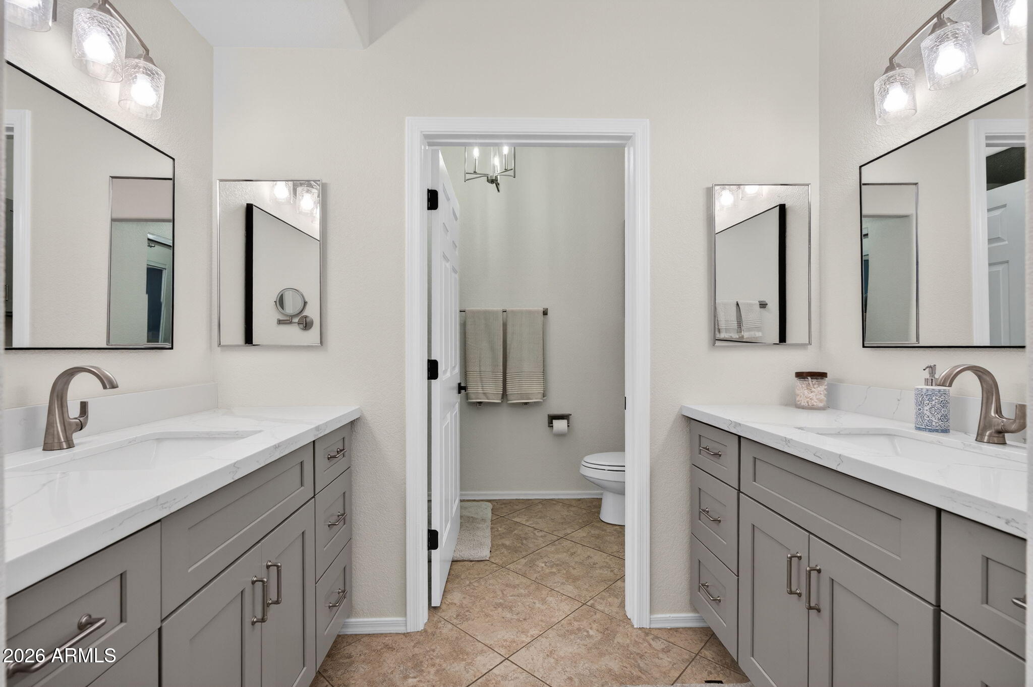 435 West Rio Salado Parkway, Unit 204 Tempe, AZ 85281 - Photo 20 of 60 a bathroom with a double vanity sink mirror and toilet