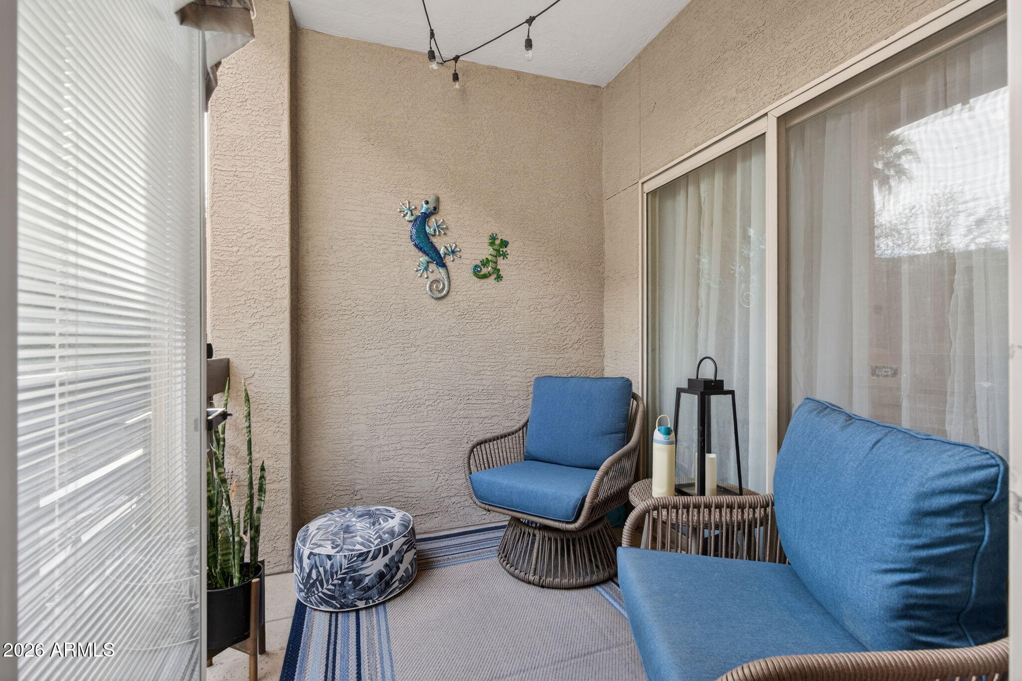 435 West Rio Salado Parkway, Unit 204 Tempe, AZ 85281 - Photo 27 of 60 a living room with furniture and a window