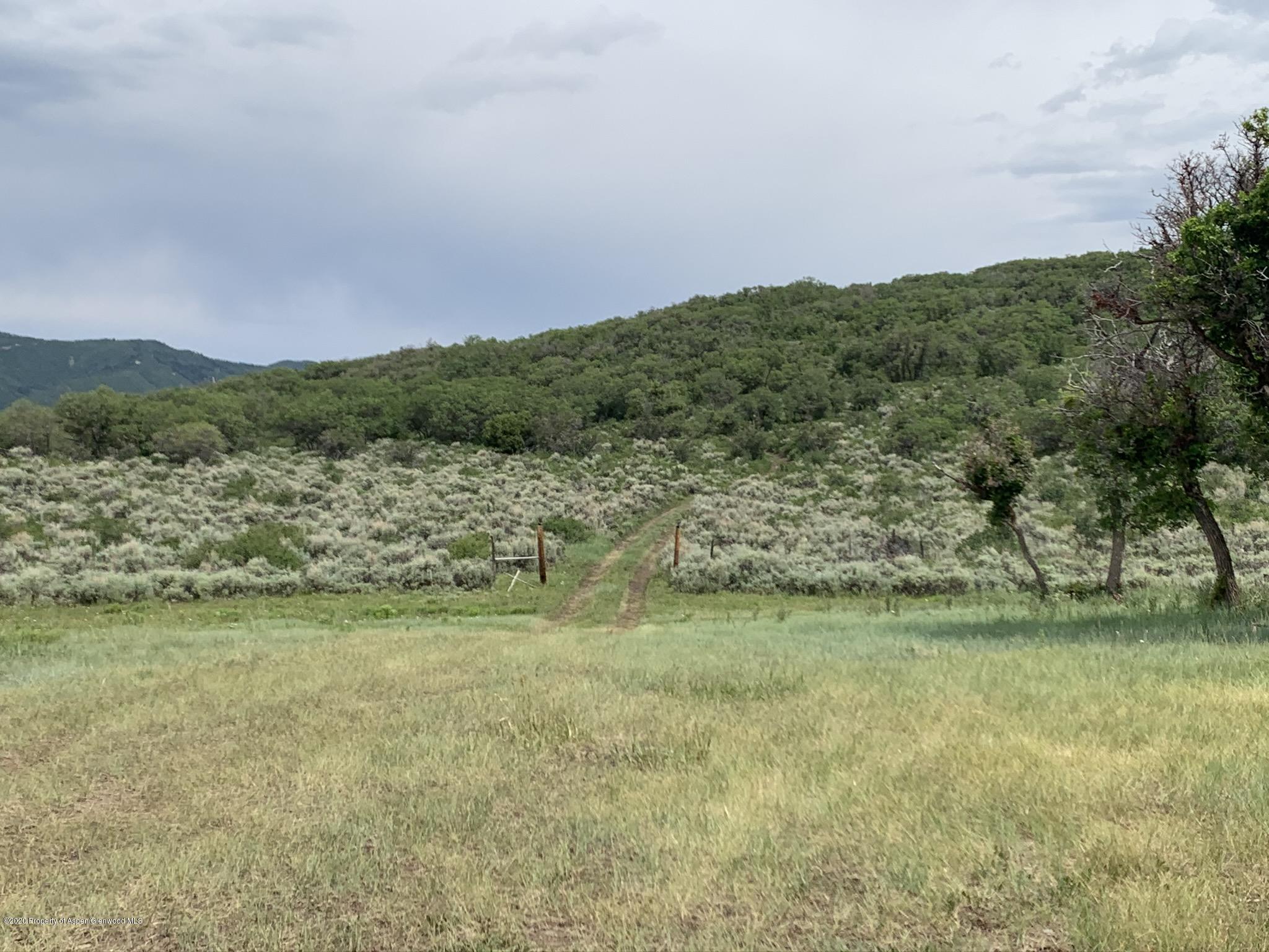 Tbd Wild Acres Ranch Road Rifle, CO 81650 - Photo 16 of 33 a view of a field with an ocean