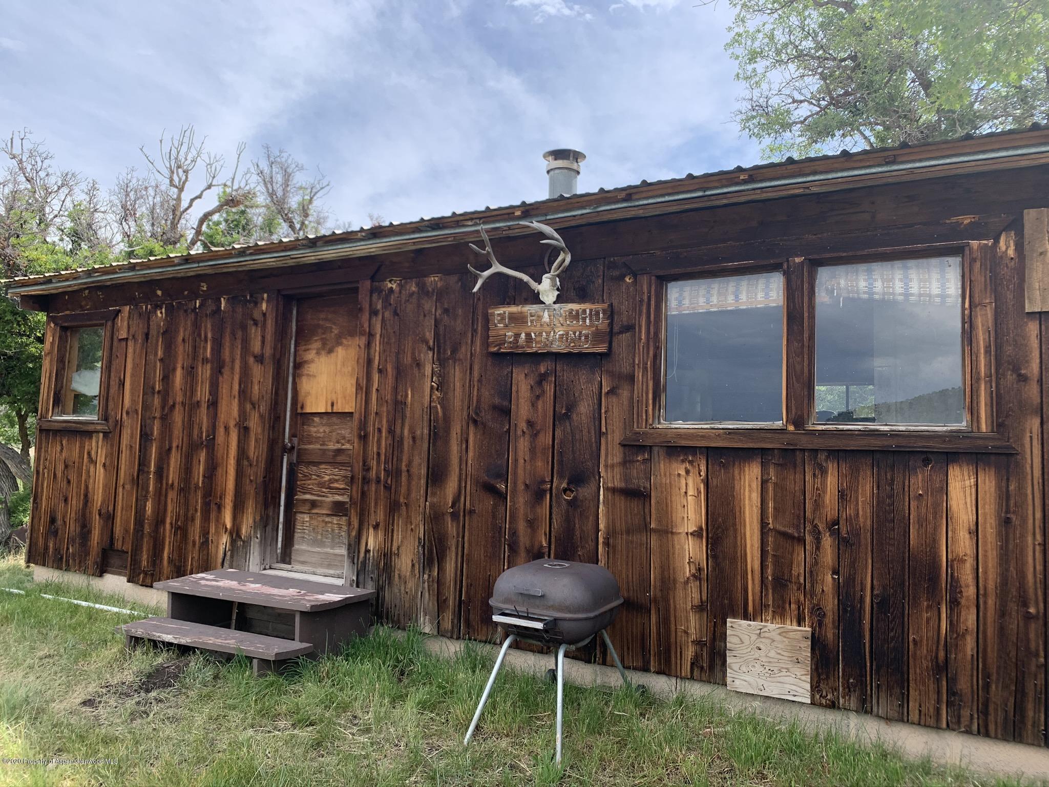 Tbd Wild Acres Ranch Road Rifle, CO 81650 - Photo 2 of 33 a front view of a house