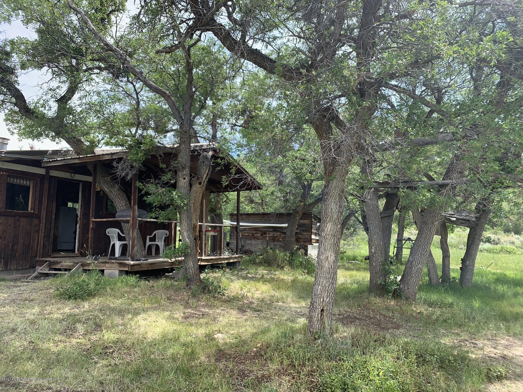 Tbd Wild Acres Ranch Road Rifle, CO 81650 - Photo 4 of 33 a view of house with a backyard