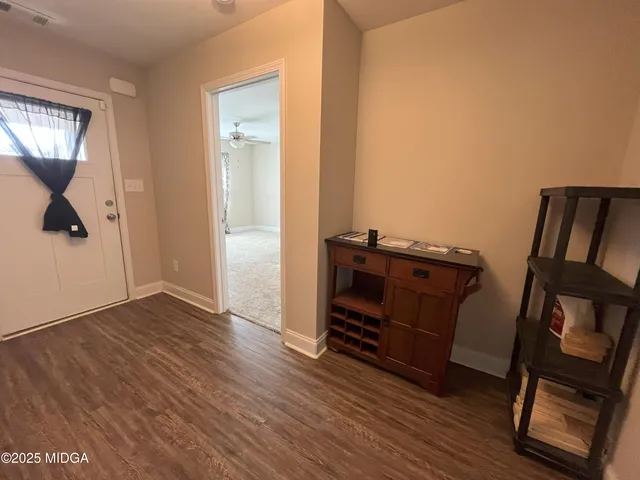 a view of storage and utility room with washer and dryer