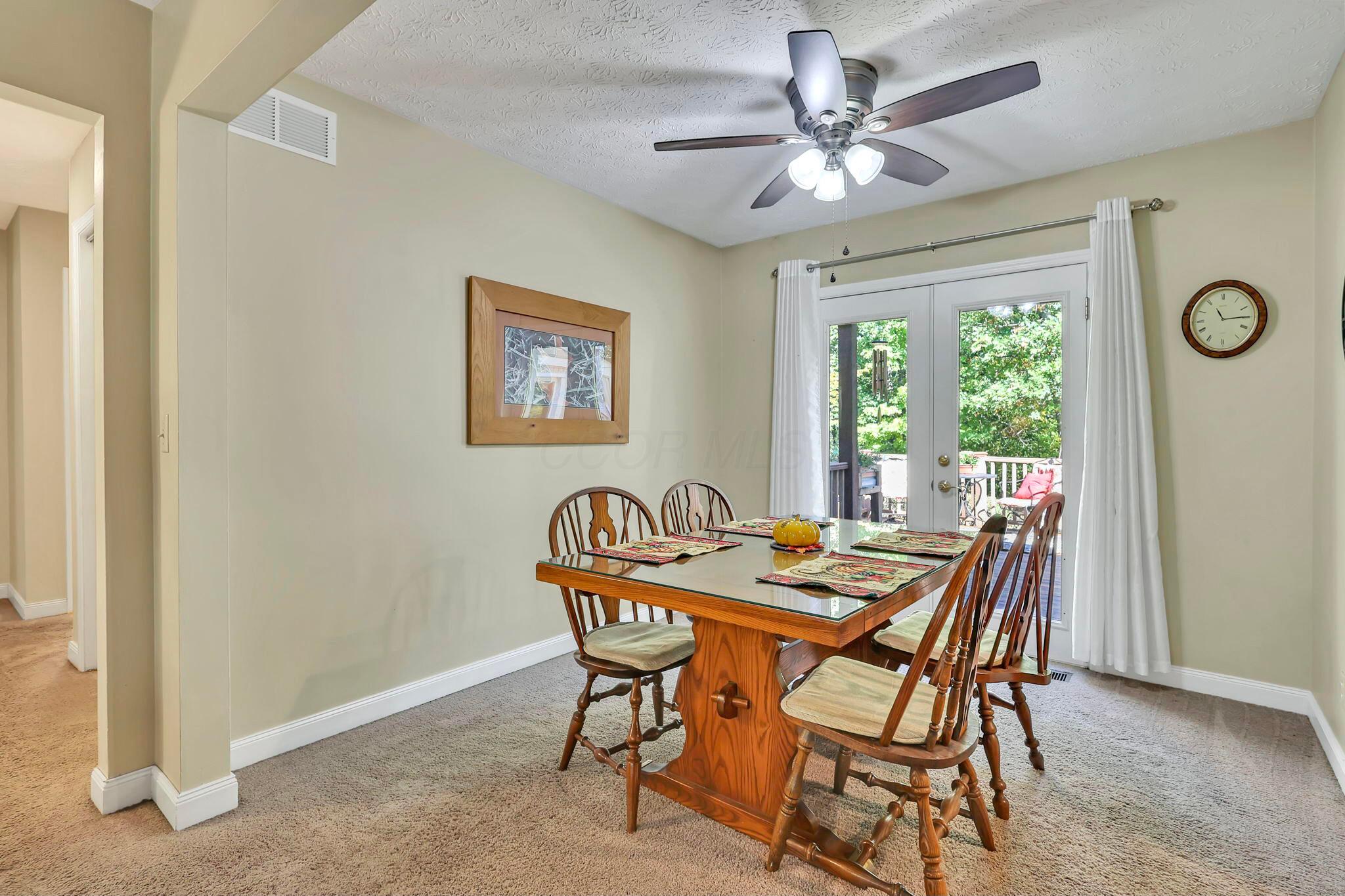 7420 Brown Road Ostrander, OH 43061 - Photo 15 of 77 Dining room has a door to the back deck.