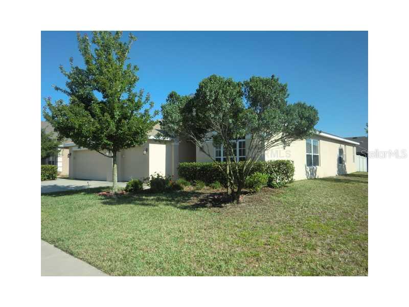 2525 Triggerfish Court Holiday, FL 34691 - Photo 1 of 1 a view of a house with a yard