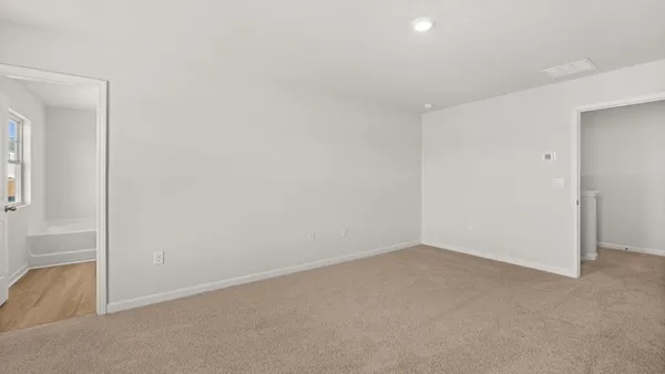 an empty room with an entryway