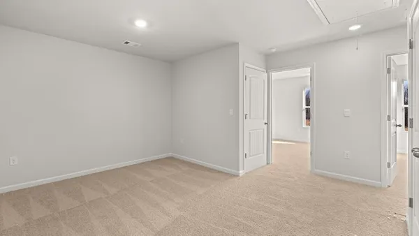 an empty room with an entryway