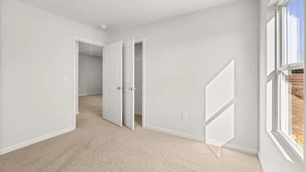 a view of entryway with bathroom