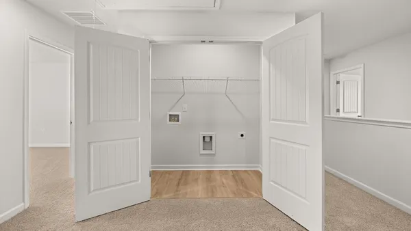 a view of a city with mountains in the background