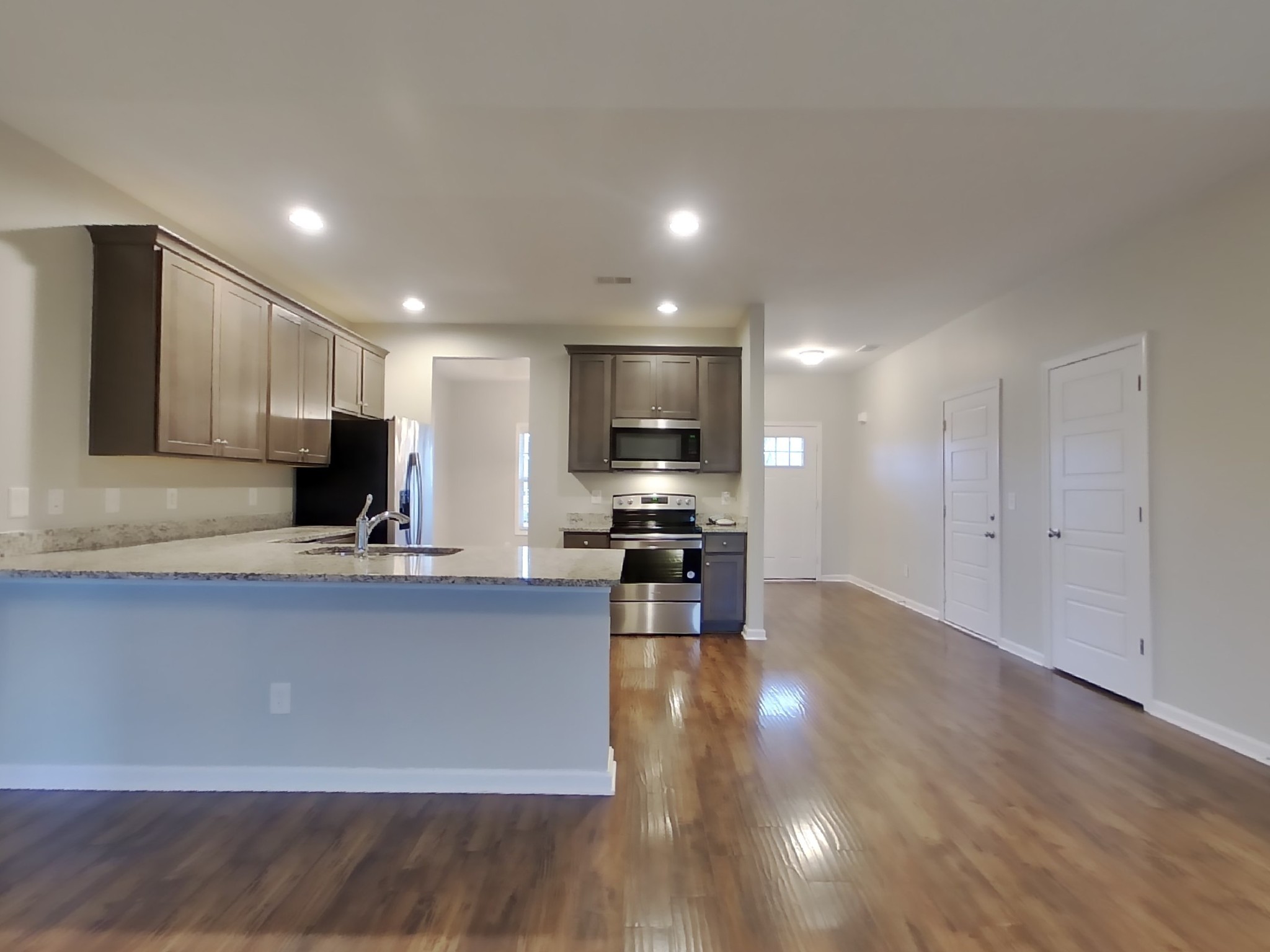 824 Ellyson Drive Spring Hill, TN 37174 - Photo 6 of 18 a view of kitchen with cabinets and wooden floor