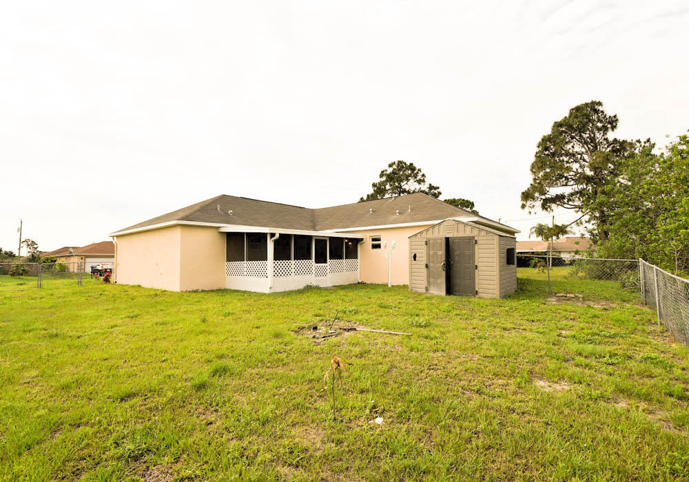 4402 Southwest Jaunt Road Port St. Lucie, FL 34953 - Photo 16 of 47 Rear 2