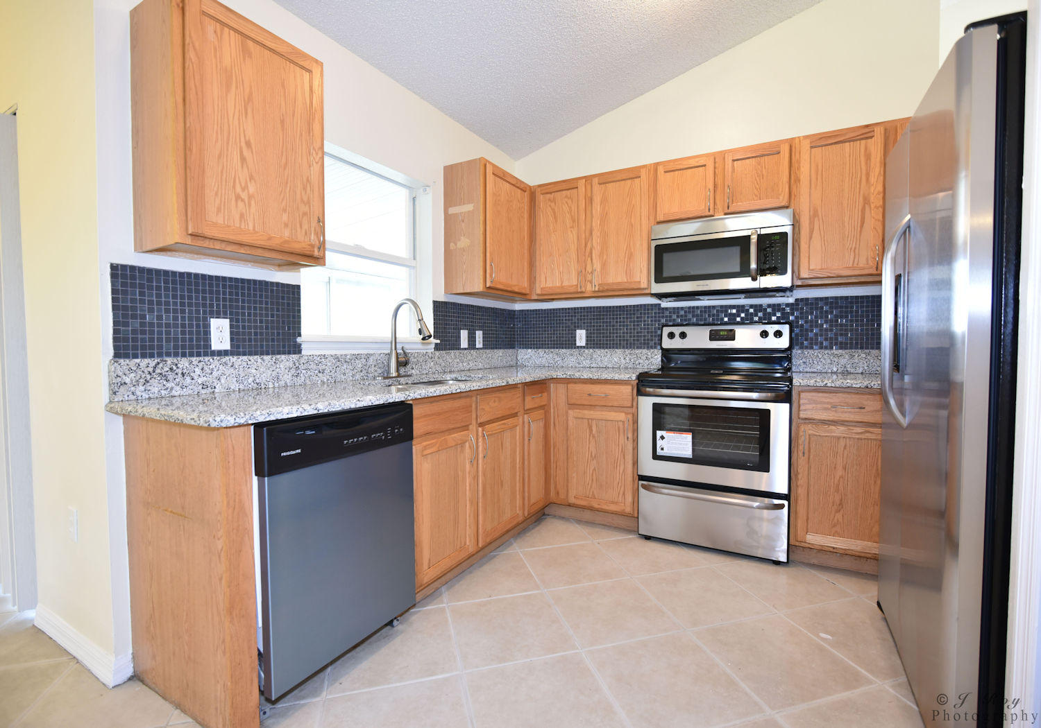 4402 Southwest Jaunt Road Port St. Lucie, FL 34953 - Photo 18 of 47 Kitchen 2