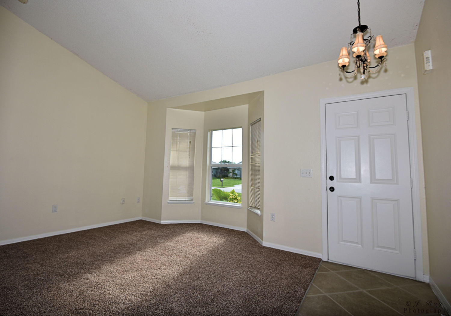 4402 Southwest Jaunt Road Port St. Lucie, FL 34953 - Photo 22 of 47 Foyer Living Room