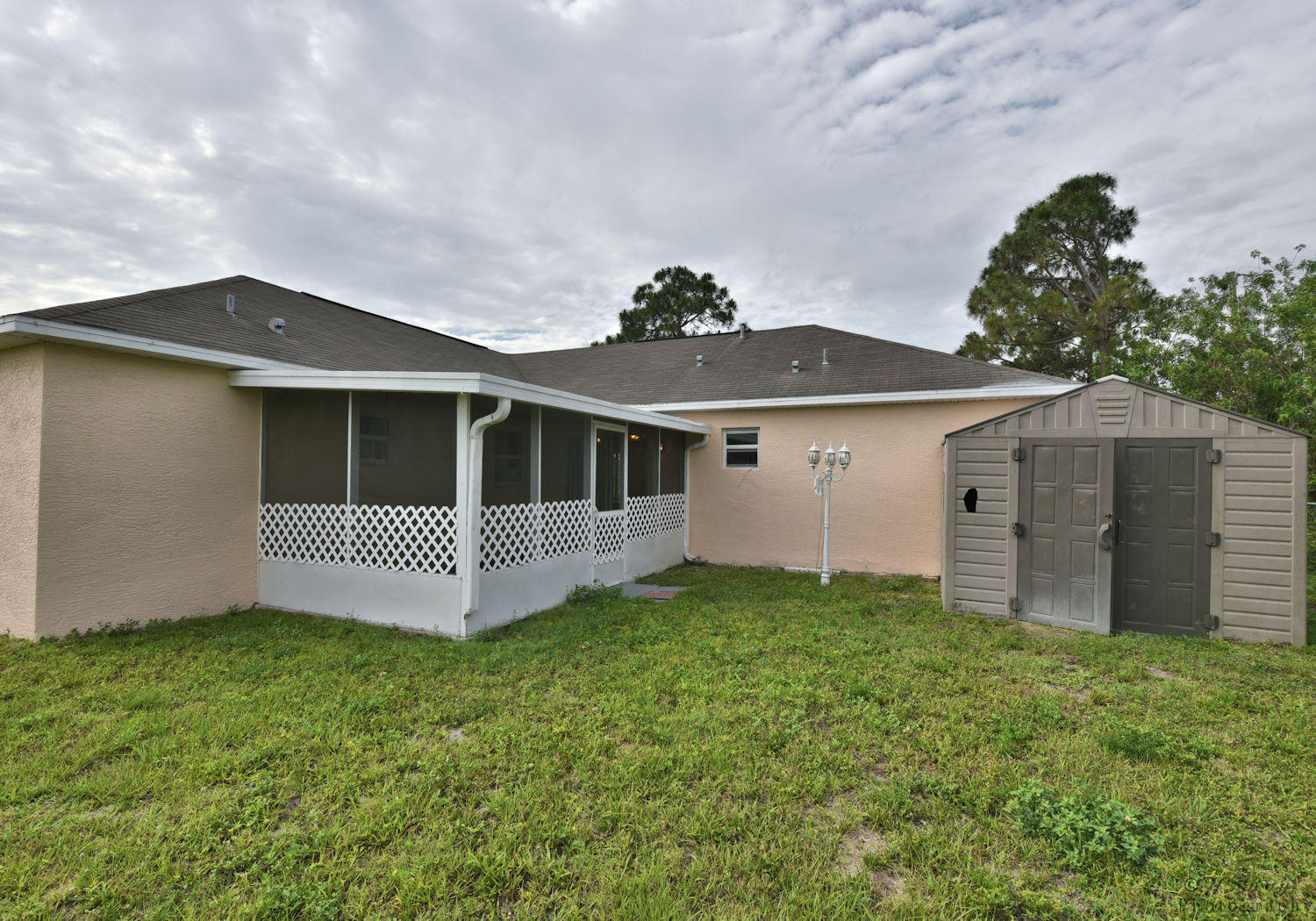 4402 Southwest Jaunt Road Port St. Lucie, FL 34953 - Photo 36 of 47 Rear 1