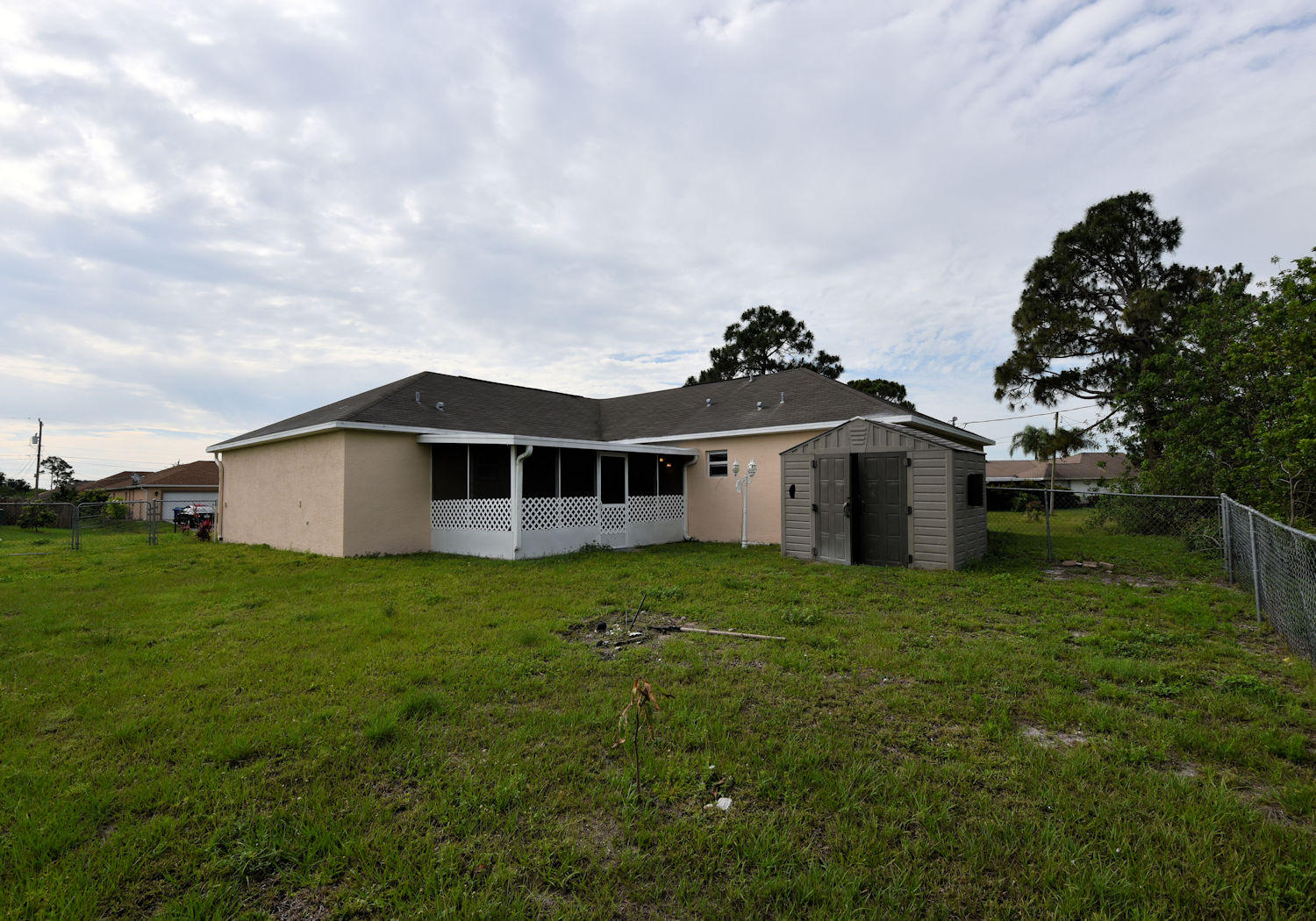 4402 Southwest Jaunt Road Port St. Lucie, FL 34953 - Photo 38 of 47 Rear 2