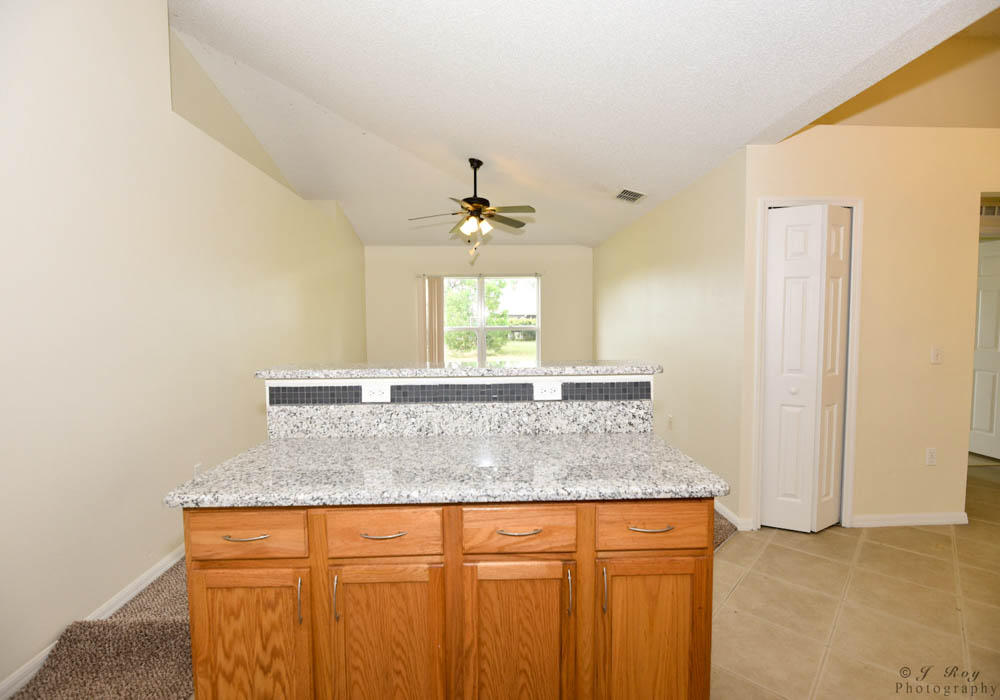 4402 Southwest Jaunt Road Port St. Lucie, FL 34953 - Photo 10 of 47 Kitchen -Family Room