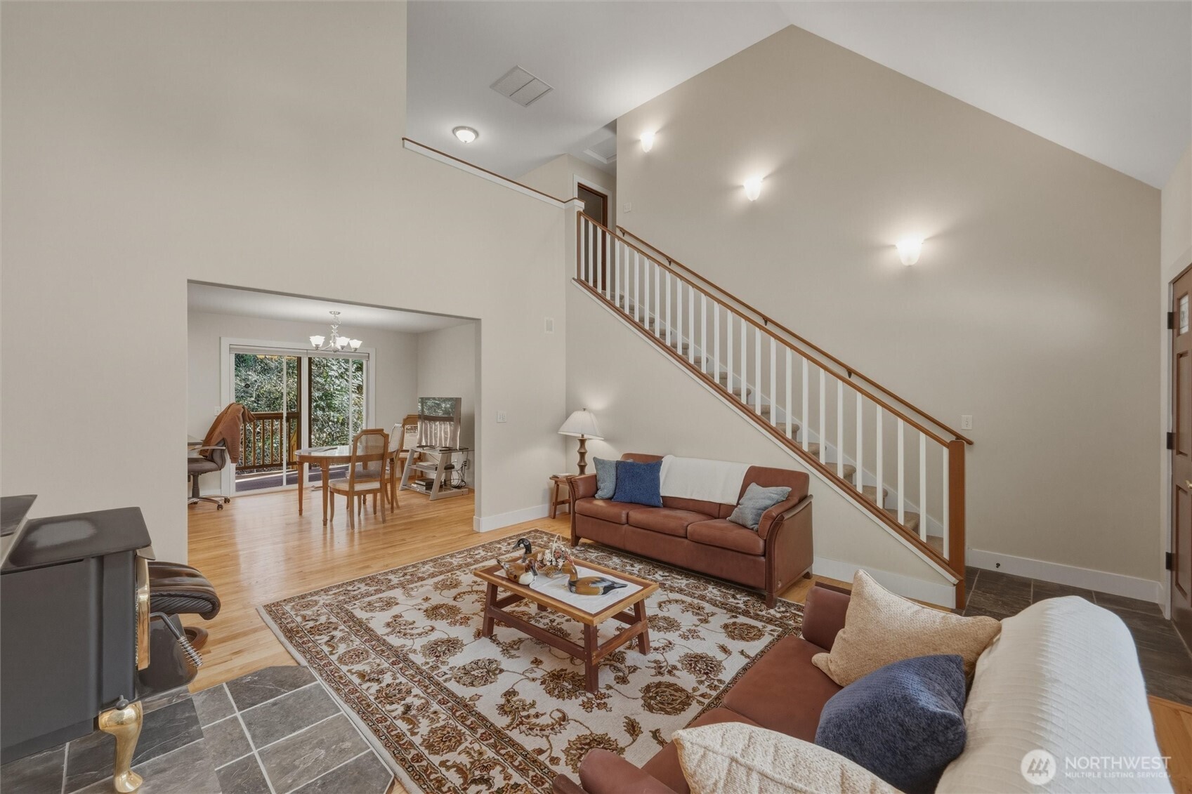 16059 Snee Oosh Road La Conner, WA 98257 - Photo 12 of 40 a living room with furniture and wooden floor