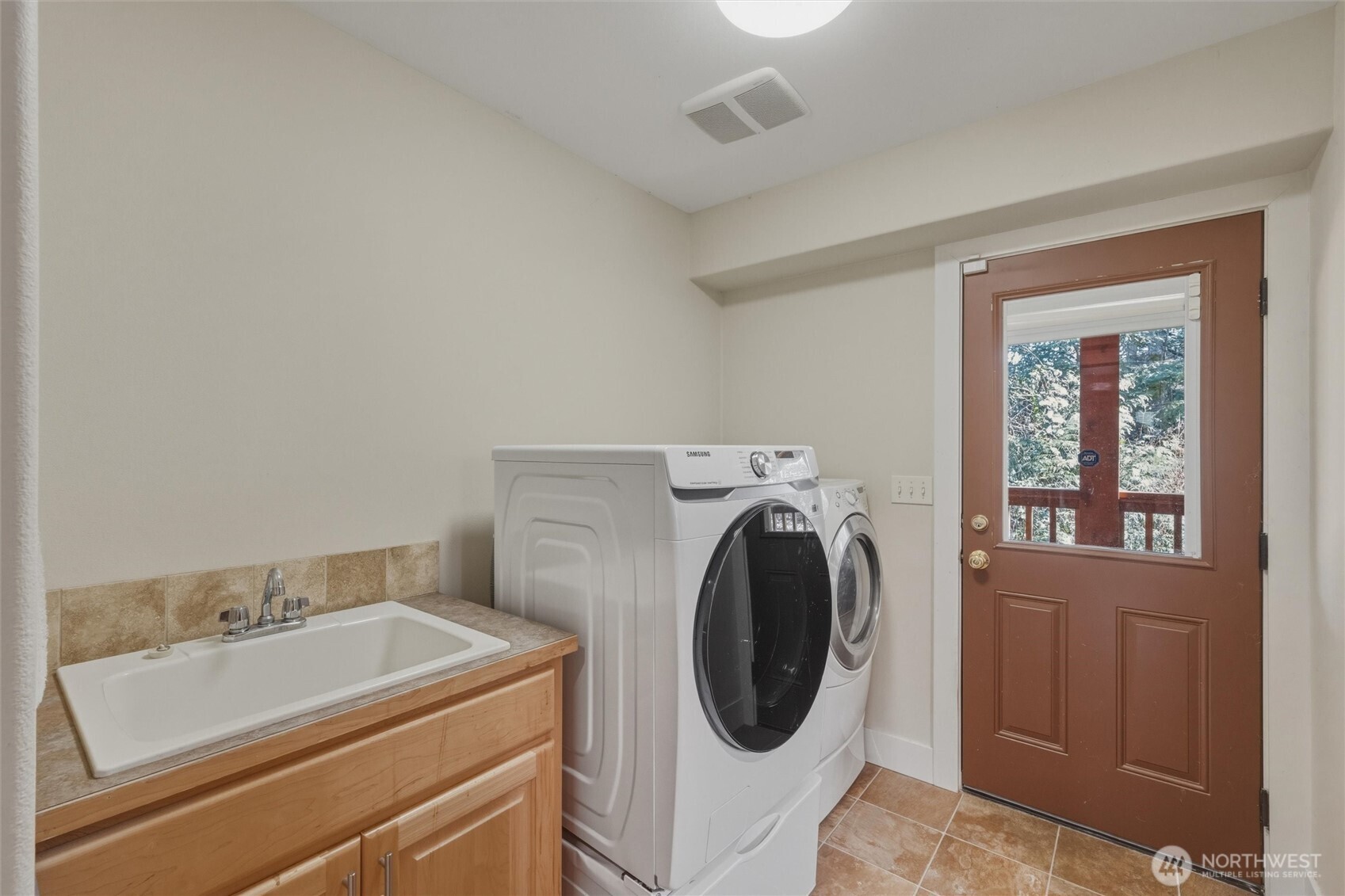 16059 Snee Oosh Road La Conner, WA 98257 - Photo 20 of 40 a utility room with dryer and washer