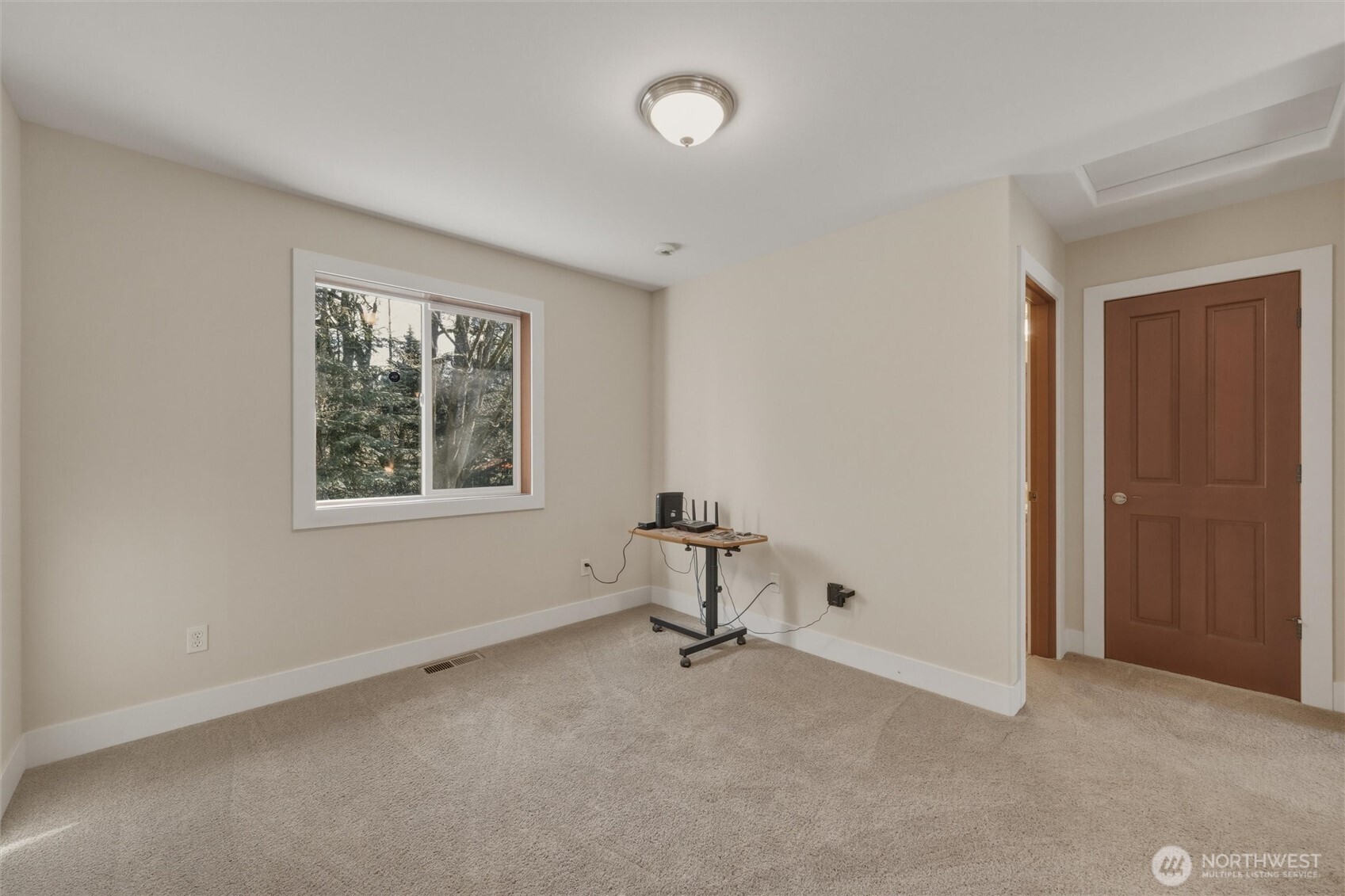 16059 Snee Oosh Road La Conner, WA 98257 - Photo 22 of 40 a view of an empty room with a window