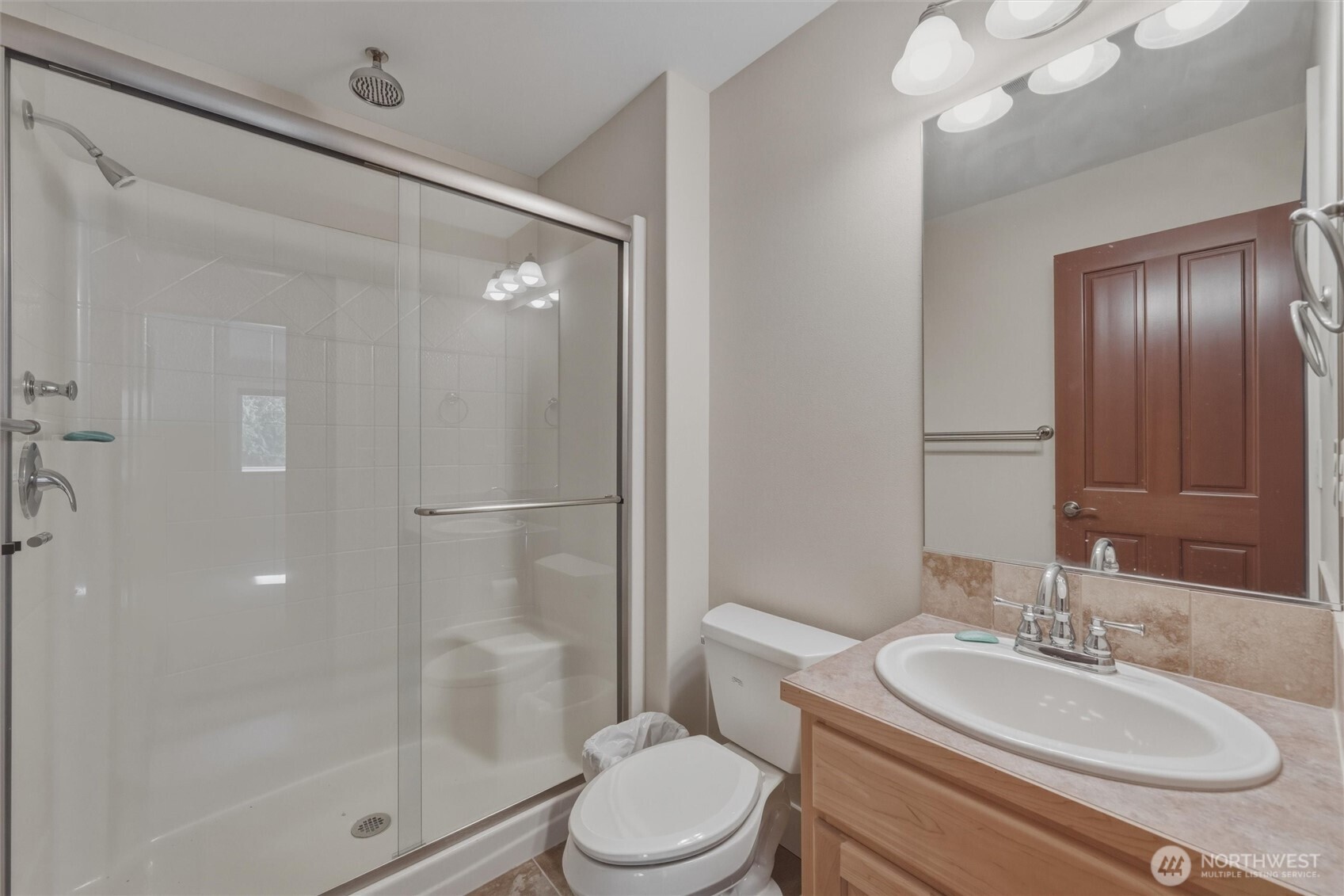 16059 Snee Oosh Road La Conner, WA 98257 - Photo 24 of 40 a bathroom with a sink a toilet and shower