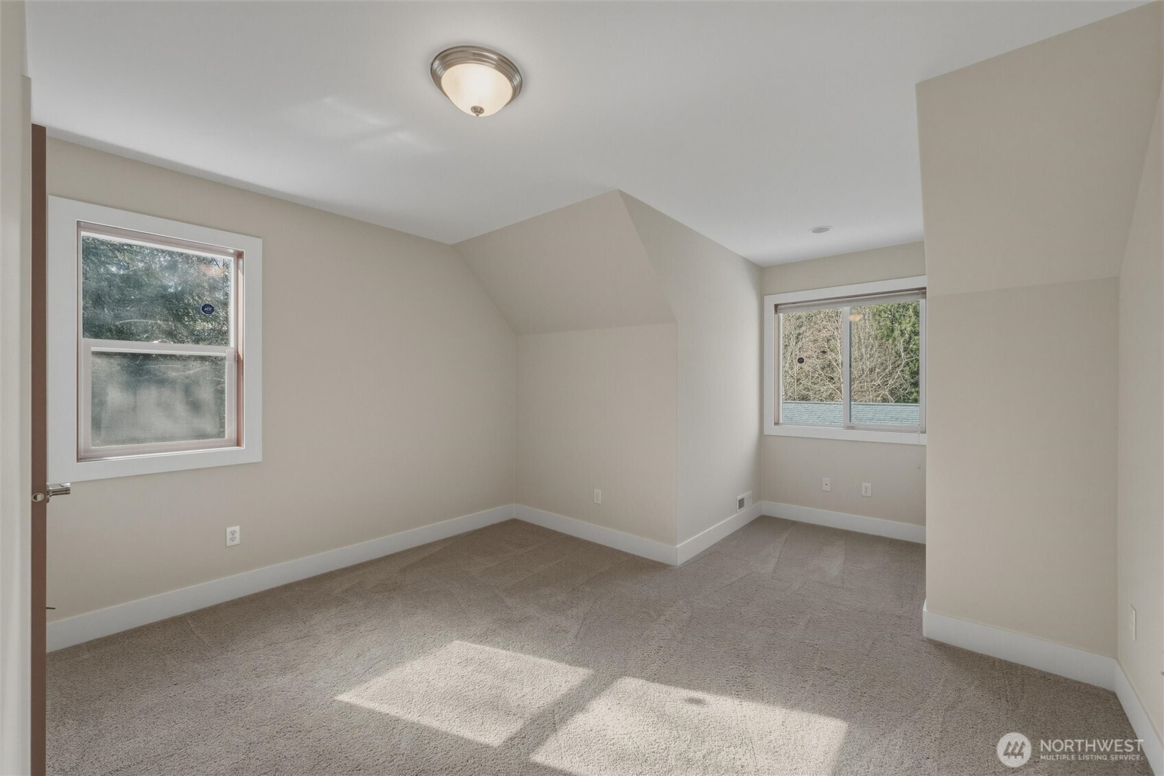 16059 Snee Oosh Road La Conner, WA 98257 - Photo 25 of 40 an empty room with windows