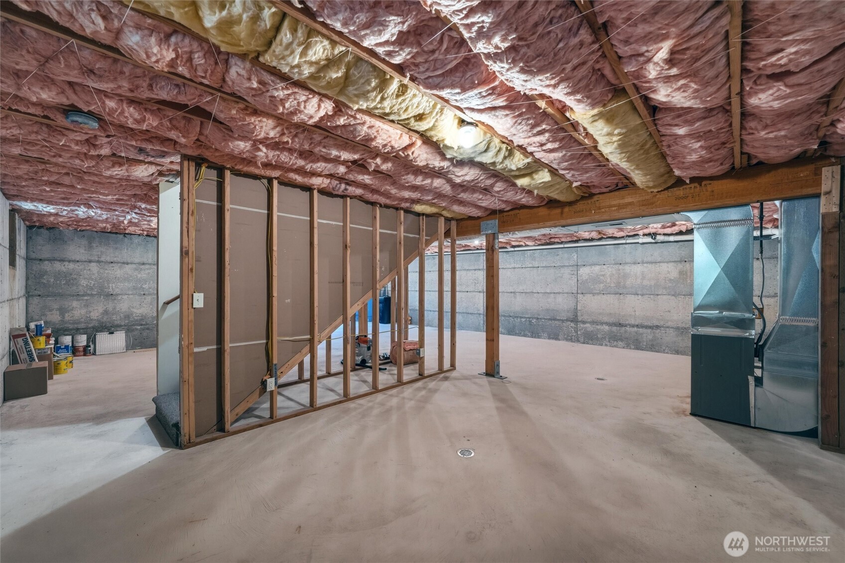 16059 Snee Oosh Road La Conner, WA 98257 - Photo 31 of 40 a view of an empty room with wooden walls