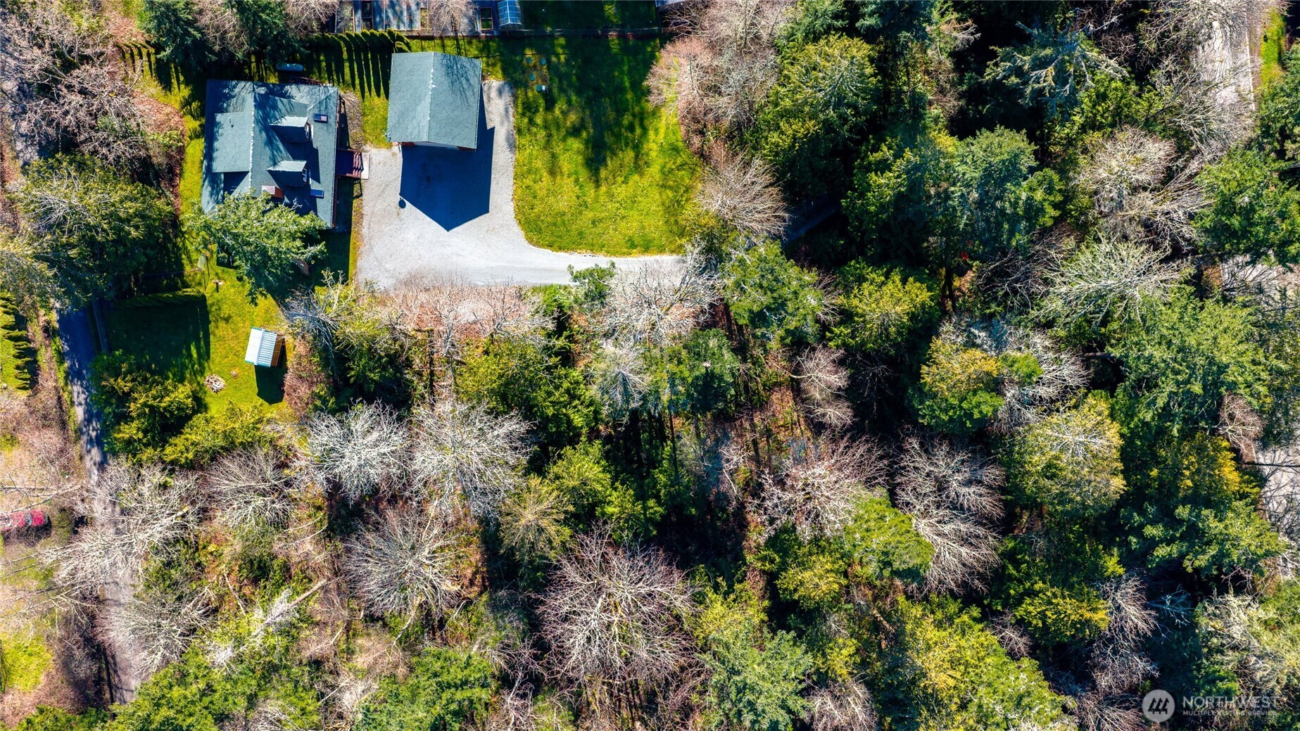 16059 Snee Oosh Road La Conner, WA 98257 - Photo 5 of 40 a view of a garden with plants