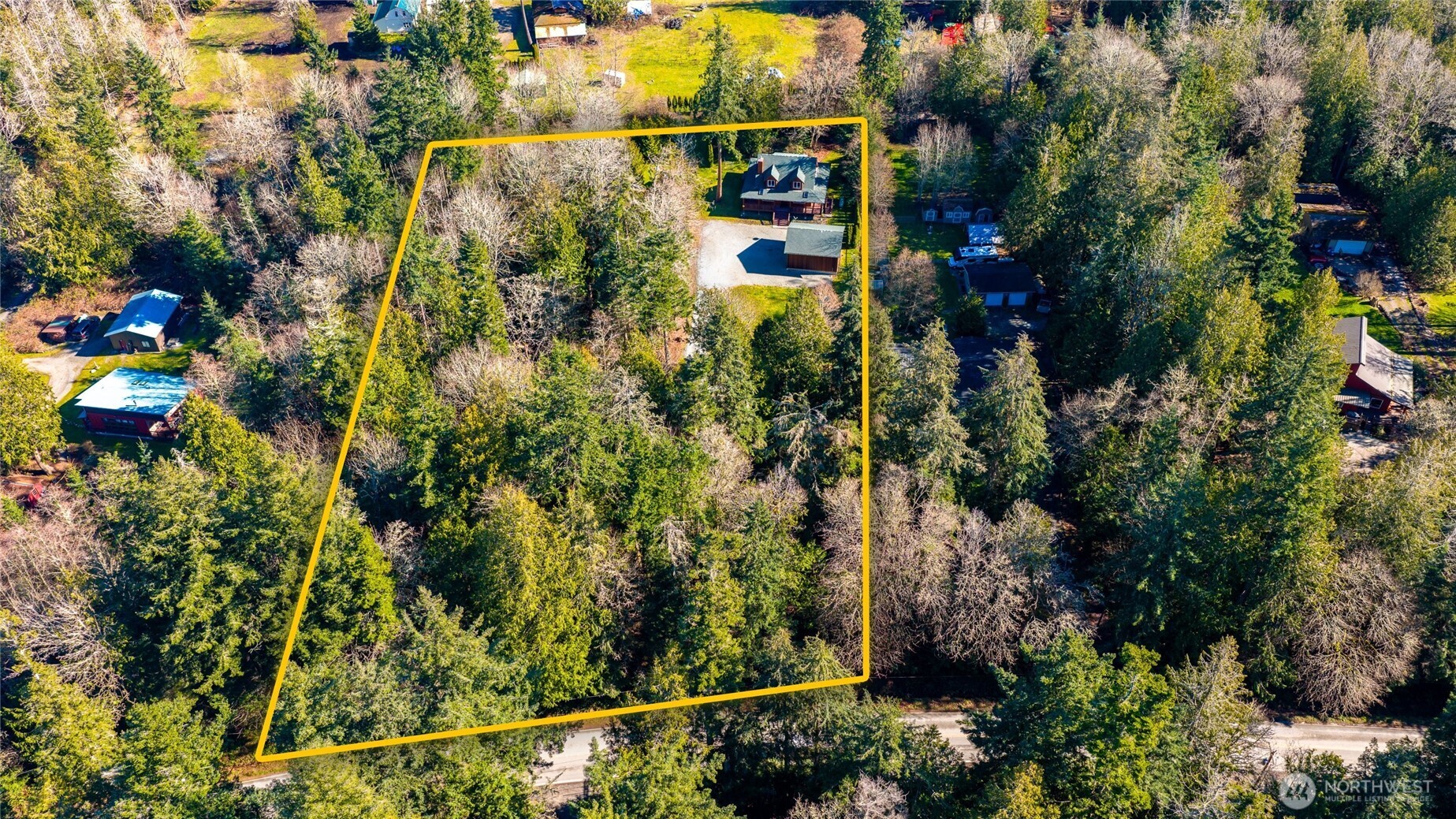 16059 Snee Oosh Road La Conner, WA 98257 - Photo 7 of 40 a view of a house with a yard