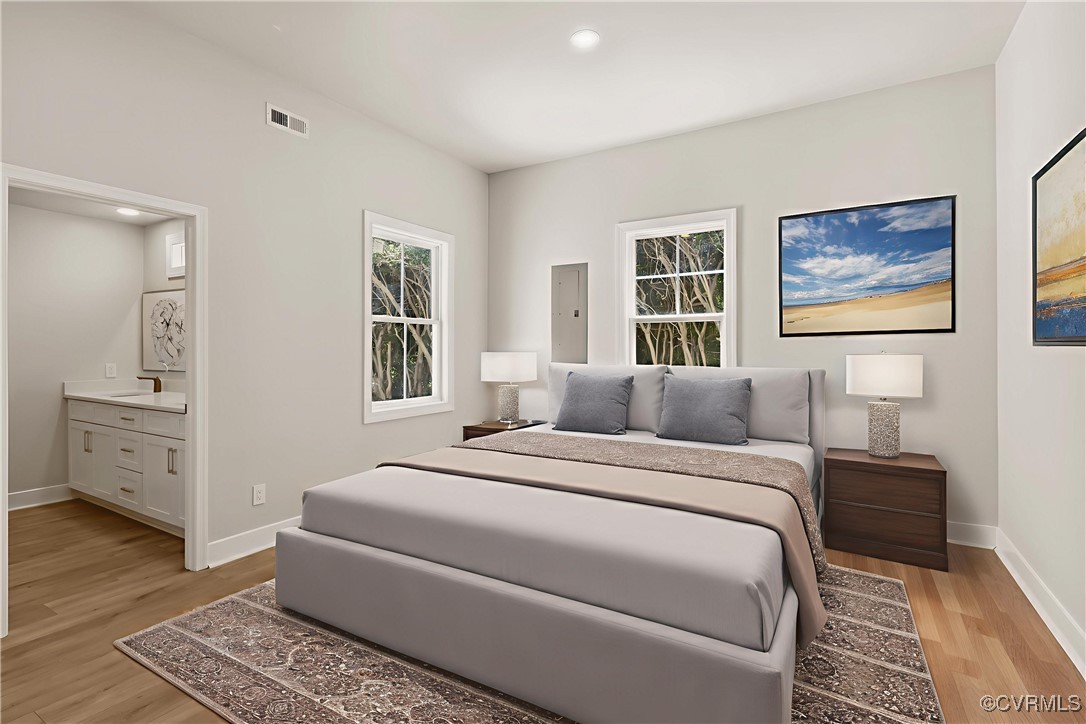 10614 Rives Avenue McKenney, VA 23872 - Photo 17 of 48 a bedroom with a large bed and a window