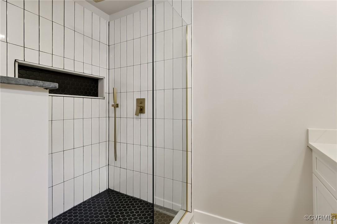 10614 Rives Avenue McKenney, VA 23872 - Photo 21 of 48 a bathroom with a shower