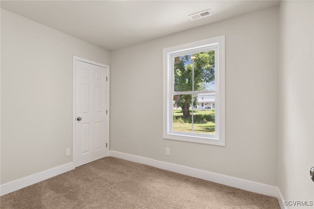 10614 Rives Avenue McKenney, VA 23872 - Photo 26 of 48 an empty room with windows