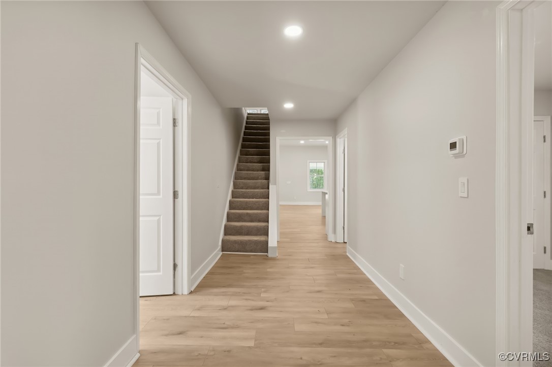 10614 Rives Avenue McKenney, VA 23872 - Photo 28 of 48 a view of a hallway with wooden floor