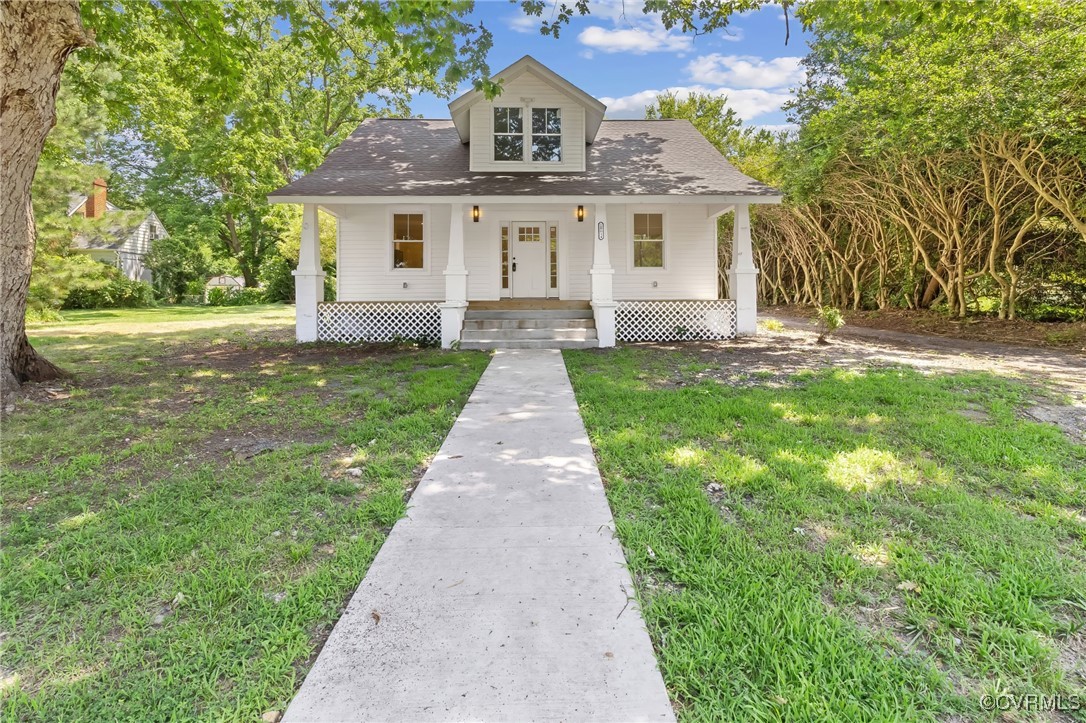 10614 Rives Avenue McKenney, VA 23872 - Photo 37 of 48 front view of a house with a yard