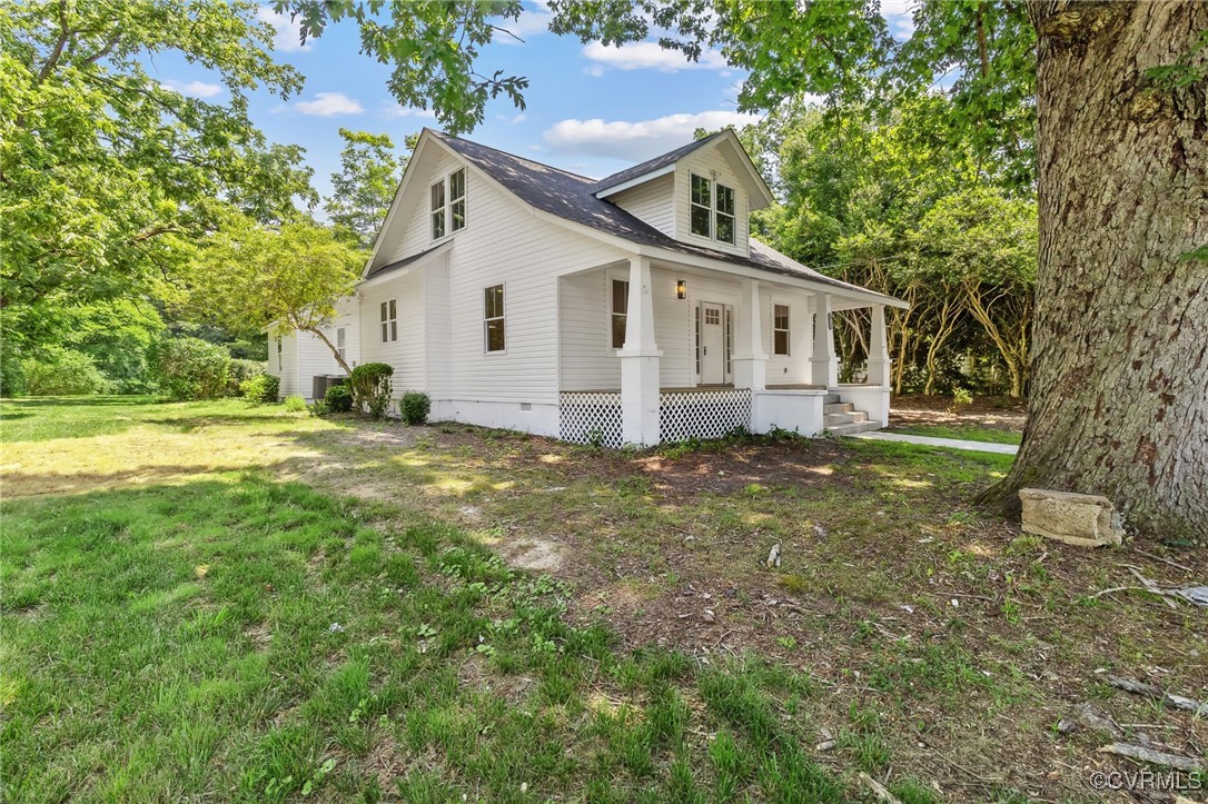 10614 Rives Avenue McKenney, VA 23872 - Photo 38 of 48 a view of a house with a yard