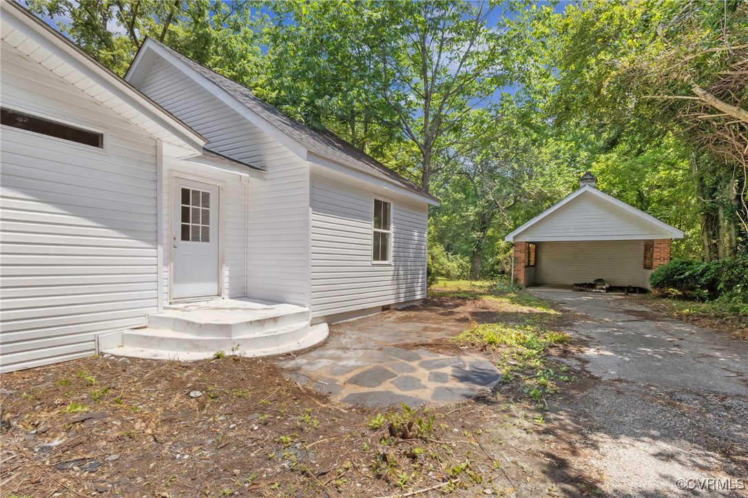 10614 Rives Avenue McKenney, VA 23872 - Photo 41 of 48 a view of a house with backyard and wooden fence