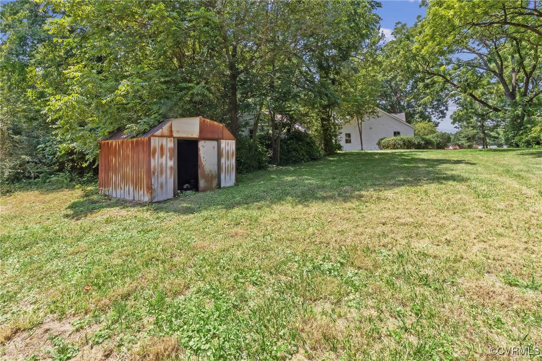 10614 Rives Avenue McKenney, VA 23872 - Photo 43 of 48 a backyard of a house with lots of green space