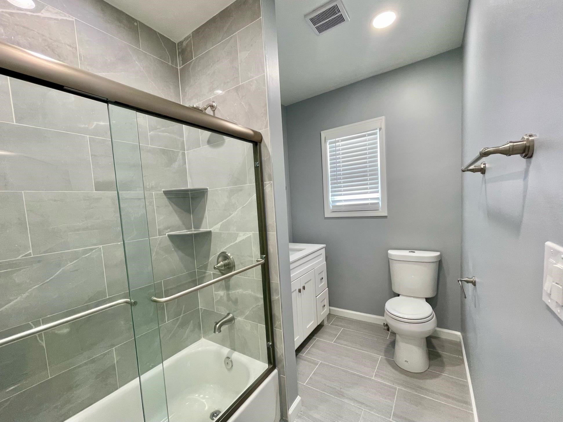 243 Hamilton Place Hackensack, NJ 07601 - Photo 4 of 8 a bathroom with a toilet and a shower