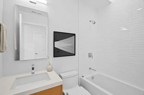 a view of bedroom with furniture