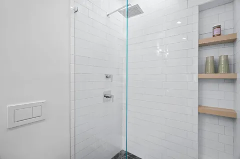a view of a patio with table and chairs and wooden floor