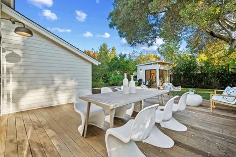 a front view of a house with patio