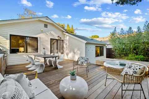 a view of chair and tables in the patio