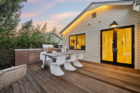 a view of house with a yard