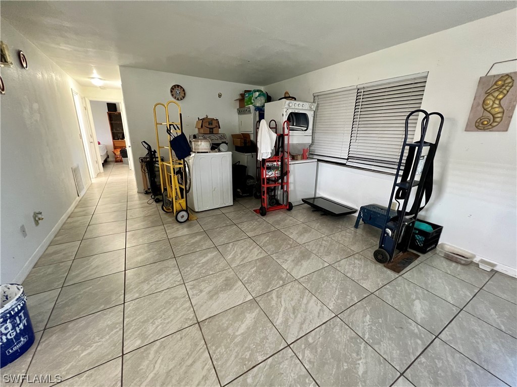 24 Alabama Road South Lehigh Acres, FL 33936 - Photo 2 of 17 a view of a room with gym equipment