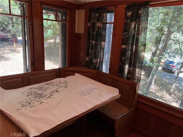 a view of a living room with a window