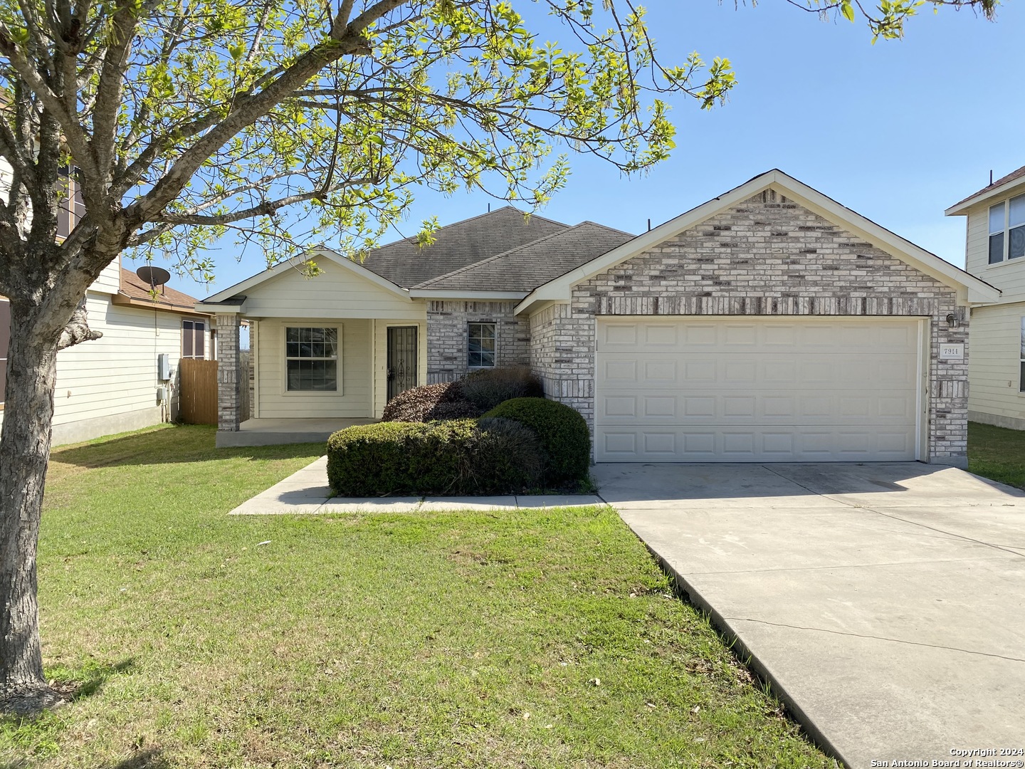7914 Sterling Manor Converse, TX 78109 - Photo 1 of 1 a front view of a house with yard and green space