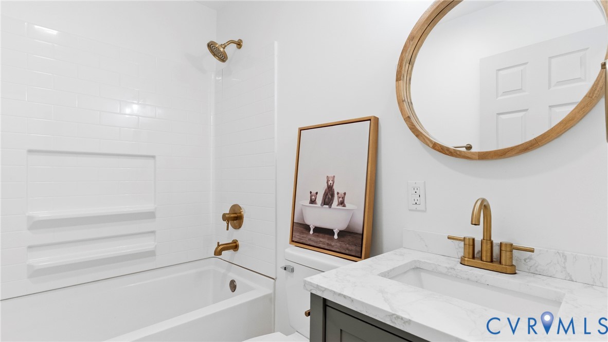 11550 Lunenburg County Road Keysville, VA 23947 - Photo 4 of 48 White subway tile tub surround with built-in shelv