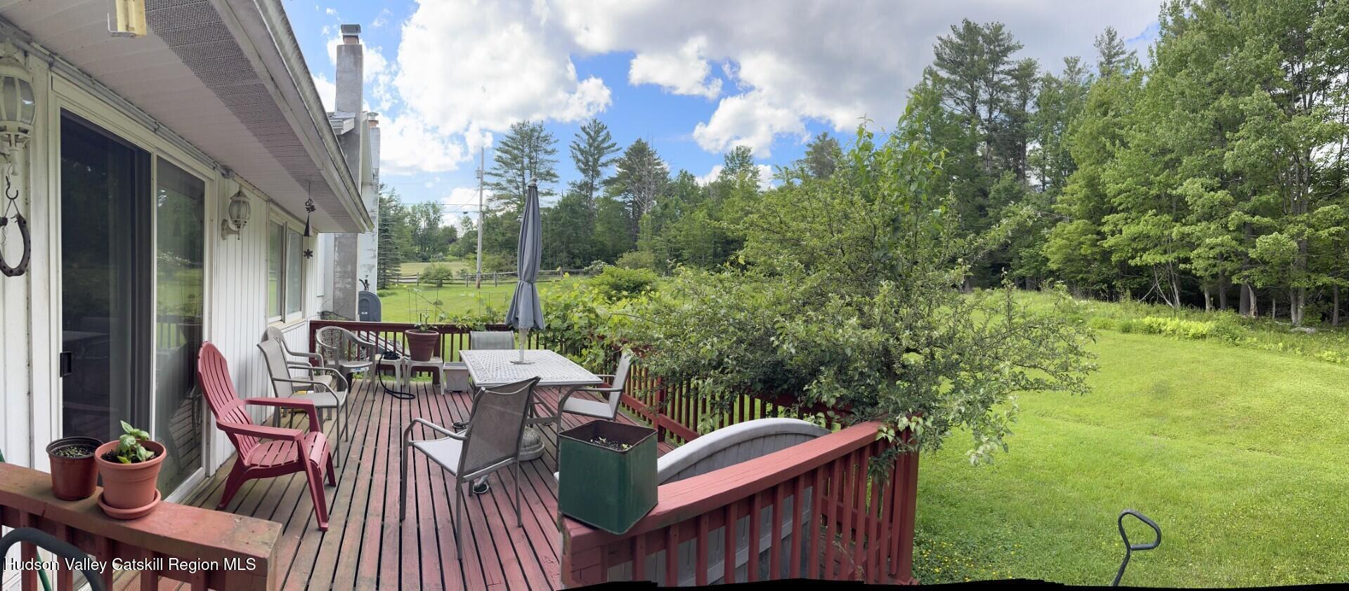 20 Slater Road Windham, NY 12454 - Photo 20 of 47 a view of balcony with furniture and garden