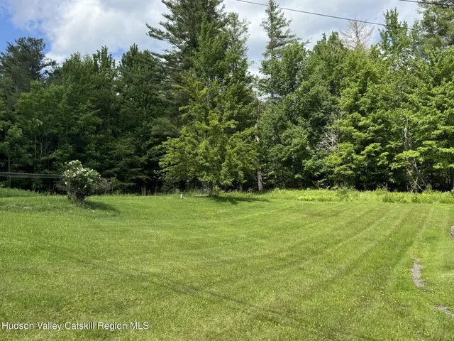a house view with garden space