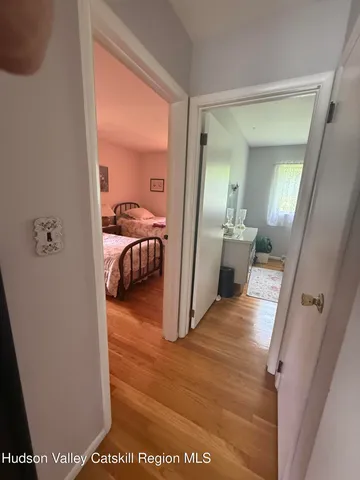 an aerial view of a house with a yard basket ball court and outdoor seating