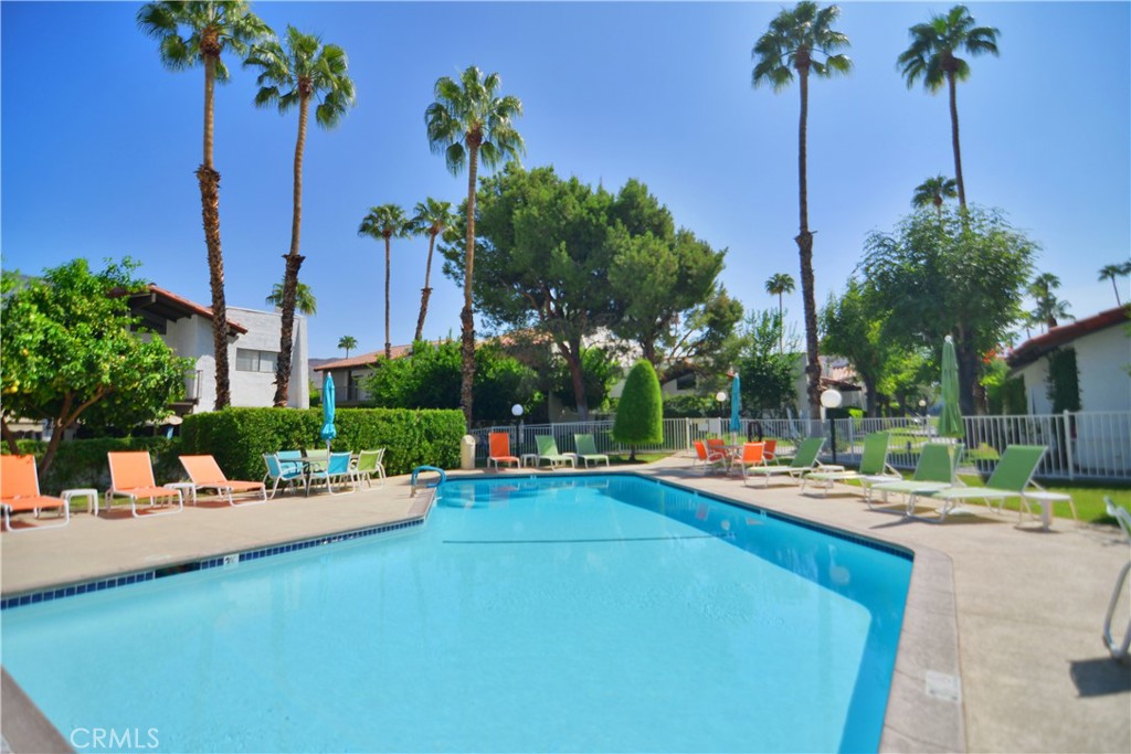 250 East San Jose Road, Unit 63 Palm Springs, CA 92264 - Photo 13 of 22 a view of a patio with swimming pool