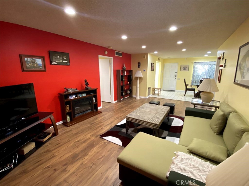 250 East San Jose Road, Unit 63 Palm Springs, CA 92264 - Photo 2 of 22 a living room with furniture and a flat screen tv